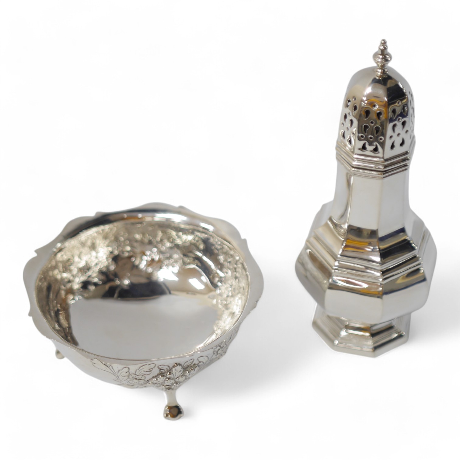 A modern silver octagonal sugar castor by Broadway & Co, Birmingham, 1992, 16.9cm and a silver sugar bowl, 8.3oz. Condition - fair to good